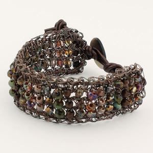 Antique copper with copper and teal beads and metallic copper leather